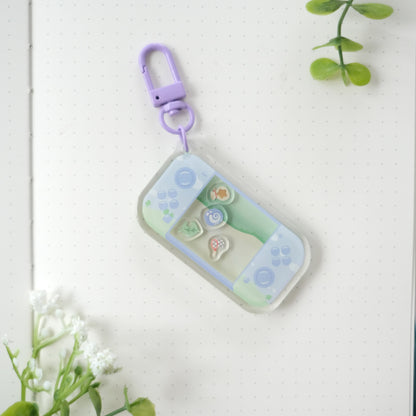 cozy crossing shaker keychain